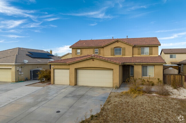 Find 2 story homes with 3 car garages in Rosamond.