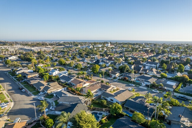 An elevated view of Downtown Costa Mesa shows it being a short distance from the ocean.