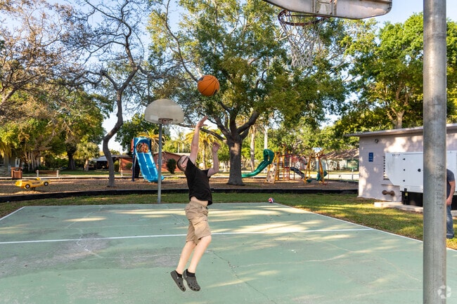 Mundy Park in Edgewood features a basketball court as well as a large play area for children.