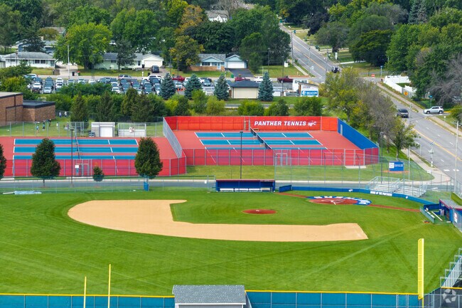 Spring Lake Park Senior High School has tennis courts and baseball fields on campus.