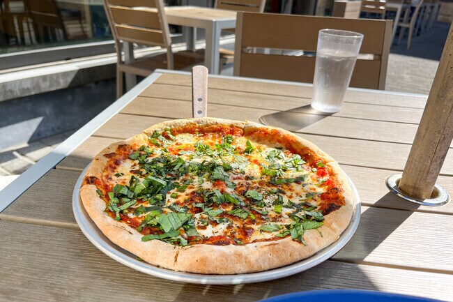 When hunger strikes, grab a pizza at Lost Dog Cafe in Parker-Gray.