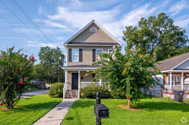 Homes in Laney Walker sit back from the road offering beautiful green yards to play in.