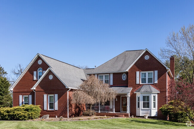 Discover charm and elegance in traditional 2-story brick homes in Halls Crossroads.