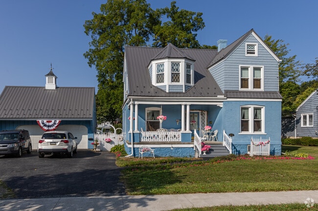Colonial homes on Logan Boulevard are well-kept with long front yards.