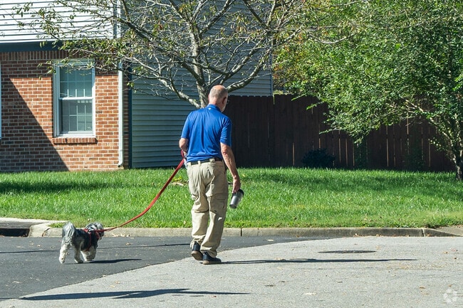 A resident taking some time with his dog in the Little Neck neighborhood of Virginia Beach.