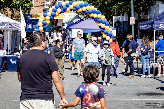 Kids and their families enjoy a beautiful fall day at the Grand Baldwin Festival.