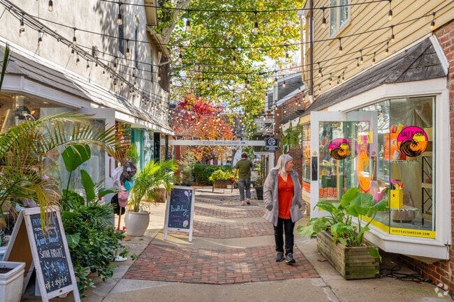 In Doylestown, residents go window-shopping along the busy streets and look for great deals.