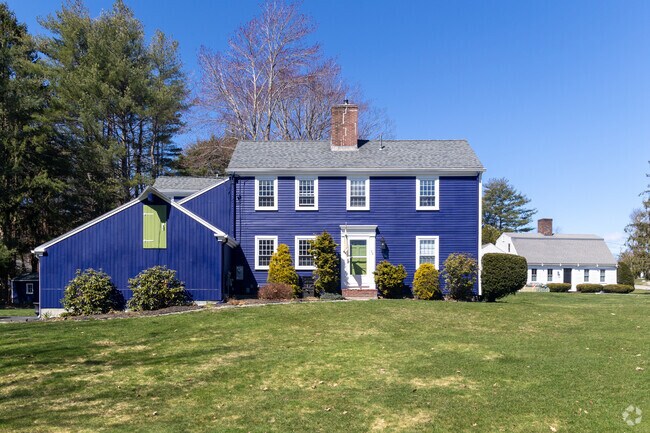 This saltbox home is nestled in Cumberland Center.