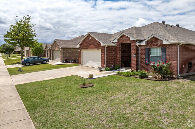 Single story homes nestle in a row in quiet suburban Wylie.