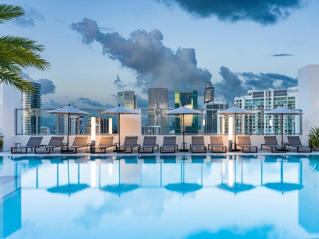 Take in breathtaking Miami skyline views from Modera Riverside’s rooftop pool deck.