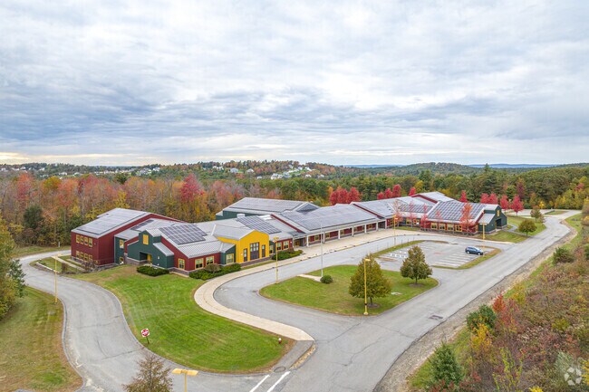 Glenwood Elementary in North Rutland is a colorful building of yellow, green, and red.