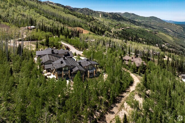 Enjoy mountain biking in summer and skiing in winter at the Colony at White Pine Canyon.