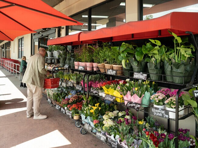 Fresh flowers are outside Trader Joe's grocery in Mira Costa.