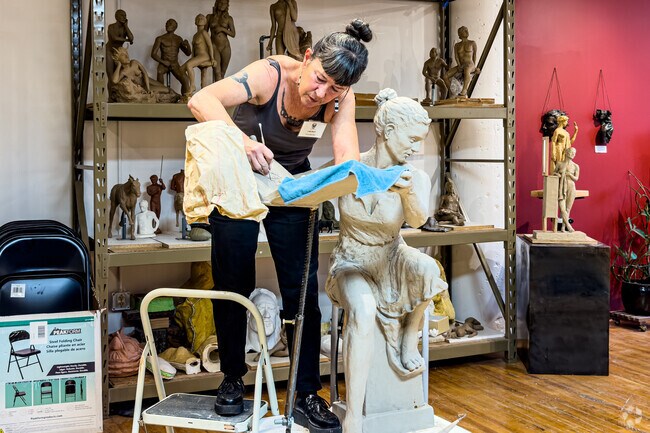 A sculptor demonstrates her skills during Art Attack at the Northrup King Building.