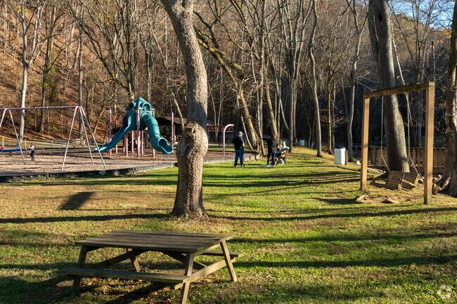 Picnic tables and playgrounds are abundant at Laurel Run Park.