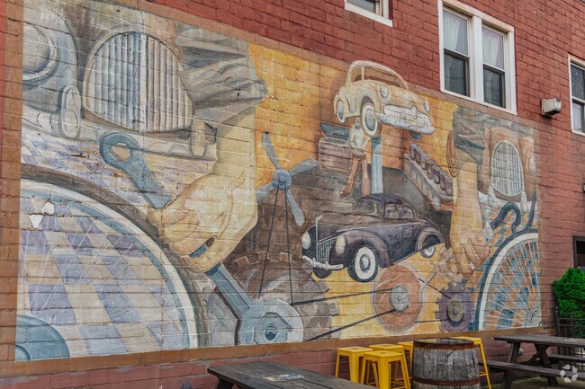 A mural pays homage to the old pump station that is now Sandy Springs Brewing Company.