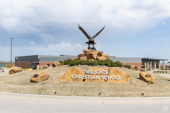 The statue of an eagle sits at the main entrance to Rejoice Christian School.