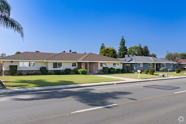 Many mid 20th century homes have large yards in Olive Drive Area.