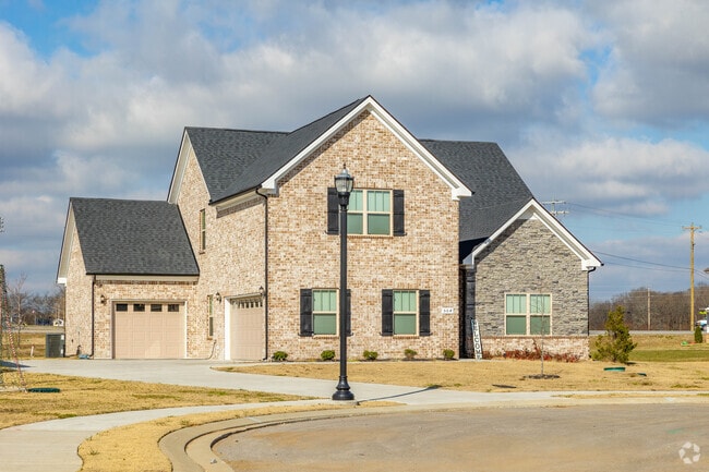 Some larger brick homes in Eagleville sit on cul-de-sacs and have two garages.