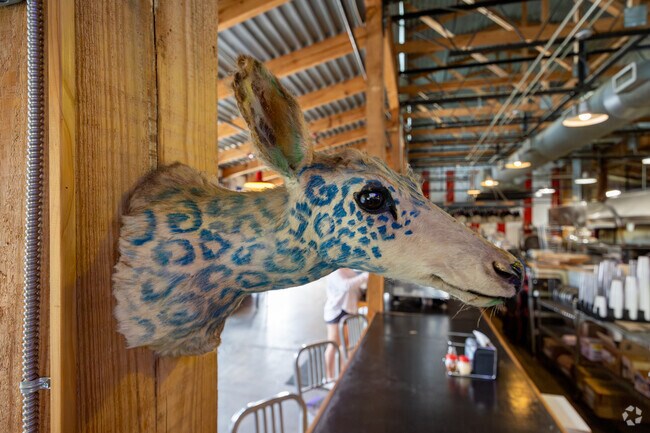 Pie Slingers Pizzeria has great art work and a wonderful collection of nicknacks.