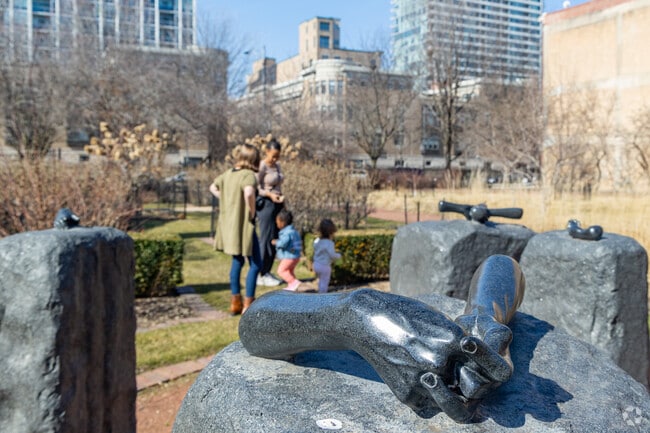 The Helping Hands sculptures honor Jane Addams at Chicago Women’s Park in Prairie District.