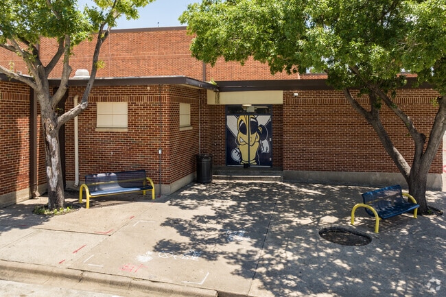 Yellowjacket pride is shown in murals at Arlington Heights High School in Fort Worth.