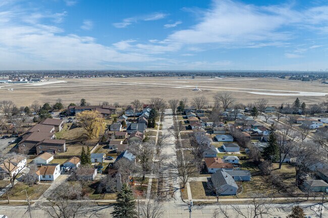An aerial view of the Timmerman West neighborhood with the airport in the Background.