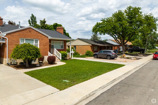 Hillcrest homes are carefully aligned, showcasing well-maintained exteriors and manicured lawns.