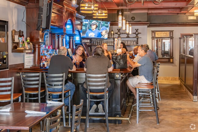 Enjoy craft beers and cocktails at the bar in Nick's Pizza, a local Glenbrook favorite.