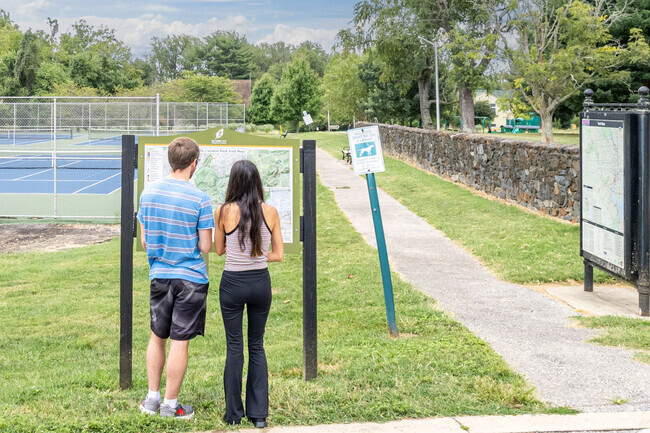 Pick a trail to explore with a friend at Leakin Park near Rognel Heights.