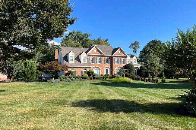 Bold brick homes on large green yards are among the sights in Fairfax Station.
