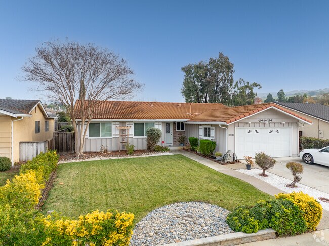 Timeless mid-century ranch home nestled in the peaceful Ashbridge area.
