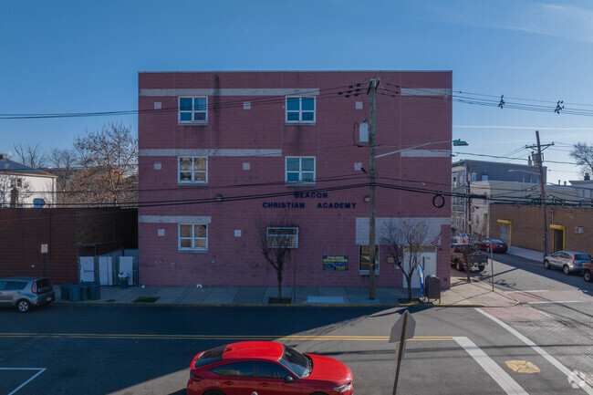 Beacon Christian Academy sits next to the lightrail connecting Bayonne, Jersey City and Hoboken.