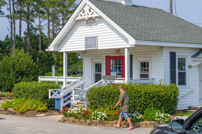 Neighbors run into each other all day long at the Manns Harbor post office.