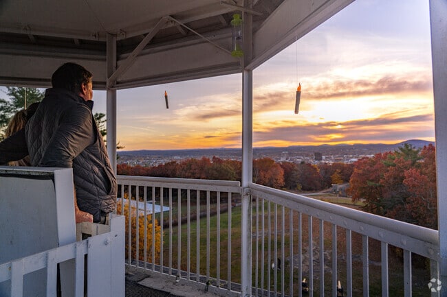 Locals make their way up to the Weston Witch Tower to enjoy the autimn sunset.