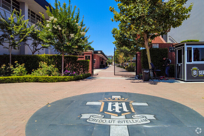 Servite High School greets students with their school logo at the entrance.