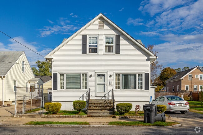 Homes in Spectacle sit close to the street with minimal front yard space.