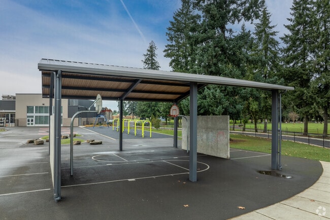 Covered courts keep students dry during recess at George C. Marshall Elementary School.