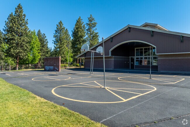 High Lakes Elementary School students can play basketball outside in Summit West.