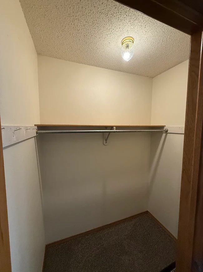 Top of stairs - large coat closet
