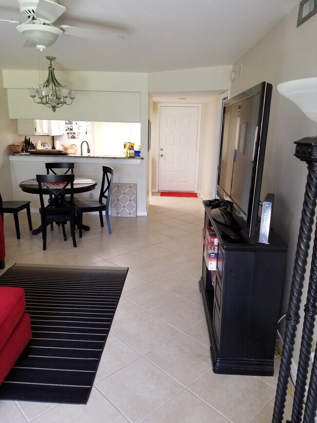 5825 Rattlesnake Hammock Rd unit 107, Naples, FL 34113 - photo 2