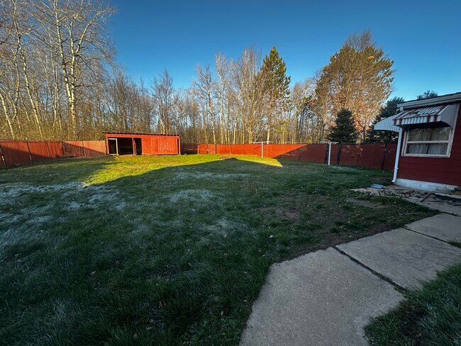 Large fenced in yard shared with upstairs.