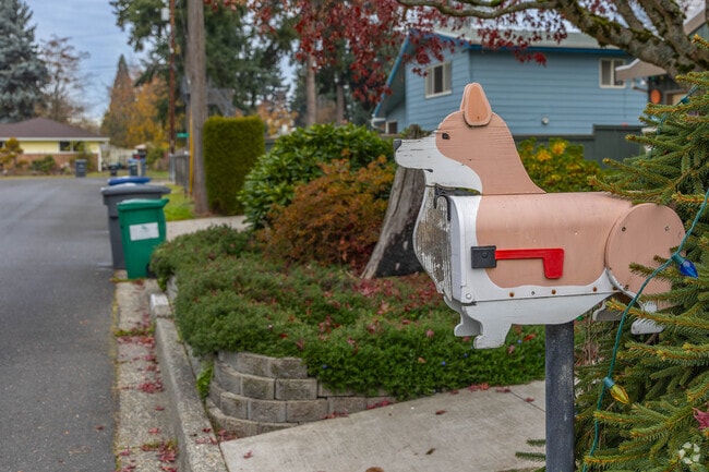 A corgi-shaped mailbox stands out among unique mailboxes in Northeast Burien.