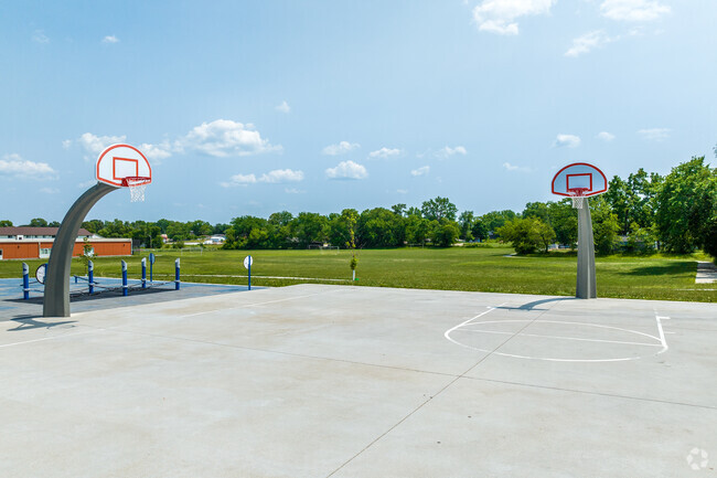 Basketball hoops encourage pick-up games at Weeks Middle School in South Park.