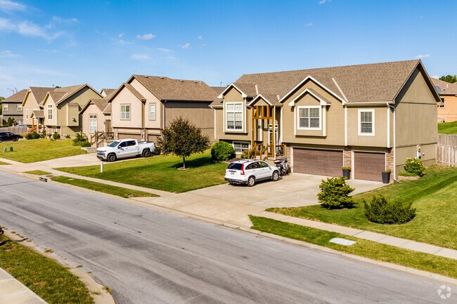 Ranch-style homes with two-car garages line Ridgefield’s streets.
