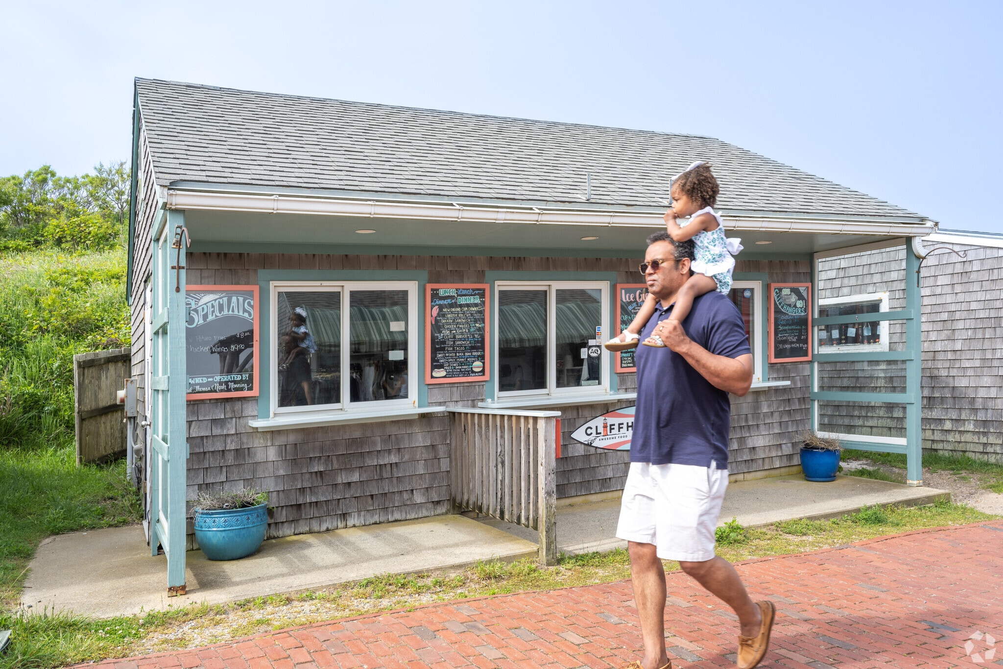 Get some food at Cliffhangers before taking in the stunning views at the Aquinnah.