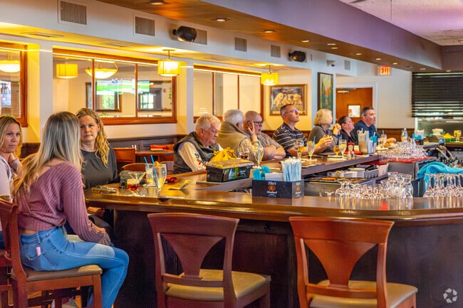 Sit at the bar with friends and family in Deptford Township at Filomena's Lakeview.
