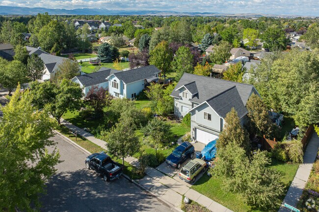 The homes of Valley Unit are surrounded by mature shade trees.
