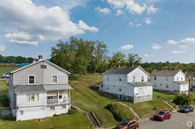 The small but charming center of Muse has homes and a school.