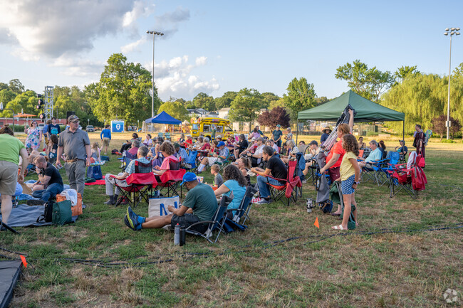 Onlookers wait in Driskell park for the yearly Shakespeare in the Park performance.